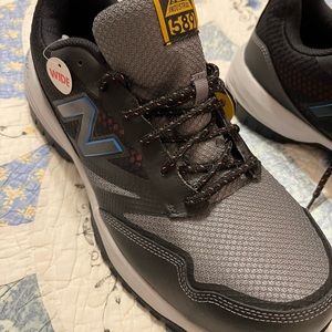 New Balance size 13 wide safety toe.